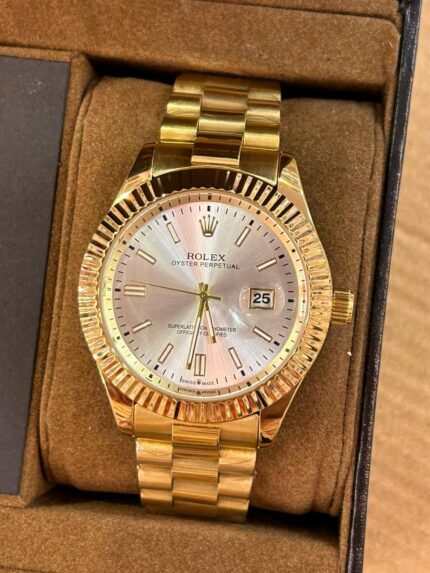 Rolex gents steel watch  Oyster Perptual Day - Date  Yellow Gold