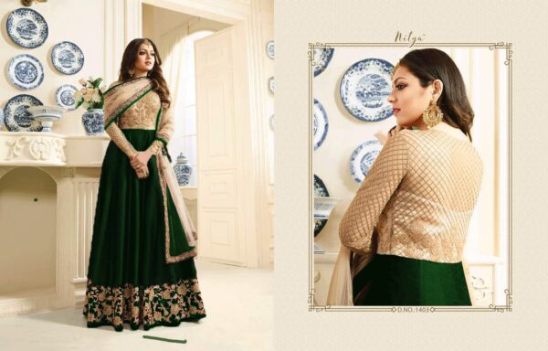 Green embroidered silk and net salwar semi stitched